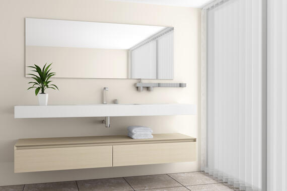 Open up a room and bring in light with the addition of a large mirror. custom mirror